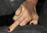 Miley Cyrus Shows Middle Finger and Panties
