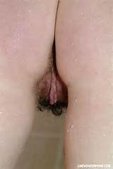 ... so she starts finger fucking her hairy pussy to orgasm in the shower