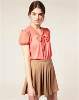 Pink pussy bow blouse with pale brown skirt