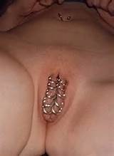 Pussy pierced with rings - Free BDSM pics