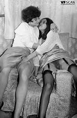 Vintage lesbians from the 60s turn each other on, hands up skirts ...