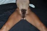 Extraordinarily hairy woman with tan lines shows her pussy