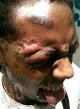 Lil Wayne Gets â€œBakedâ€ Tattoo On Forehead