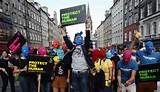 Protesters wearing Pussy Riot's signature balaclavas take part in an ...