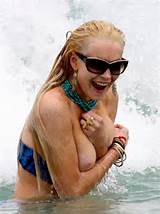 ... slip and boob slip at miami beach lindsay lohan nip slip and boob slip