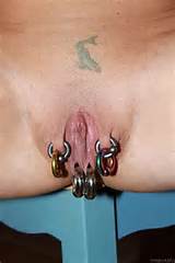 Extreme Pussy Piercing Nude Female Photo