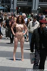 ... Amber walks totally naked through the busy streets of San Francisco