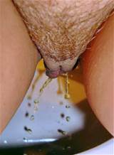 wetandpissy:Redhead girl peeing pussy close up.