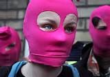 Pink balaclavas for demonstrators in Edinburgh. Pussy Riot supporters ...