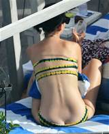 Katy Perry is teasing us in this bikini . She really could have shown ...