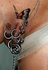 heavy pierced pussy with tattooed butterfly â€¦