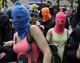 group Pussy Riot members Nadezhda Tolokonnikova, in the blue balaclava ...