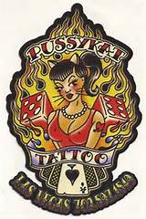 The old Pussykat Tattoo Parlor sign.