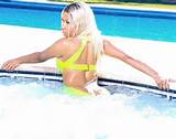 Nicki Minaj showed off her back as she posed in a hot tub. Copyright ...