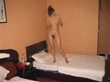 This playful girlfriend is seen nude in a hotel room and at home in ...