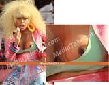Pics) Nicki Minaj lets a nipple slip out!
